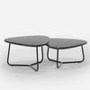 Two modern coffee tables with marble top and metal frame on a white background
