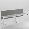 White office desk with gray partition screens on a light gray background