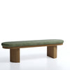 Bench with green cushioned seat and wooden frame on a white background