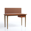 Wooden desk with a woven backrest on a white background