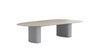 Modern dining table with a light gray surface and textured base on a white background