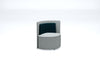 Gray and navy cushioned chair on a white background