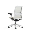 White office chair with black accents on a white background