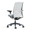 White office chair with black base on a white background